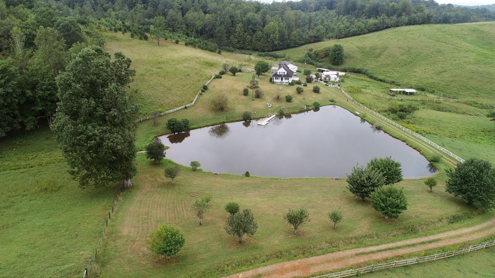 5560 Elamsville Road Stuart, VA 24171 - Photo 47 of 80 a view of a lake from a balcony