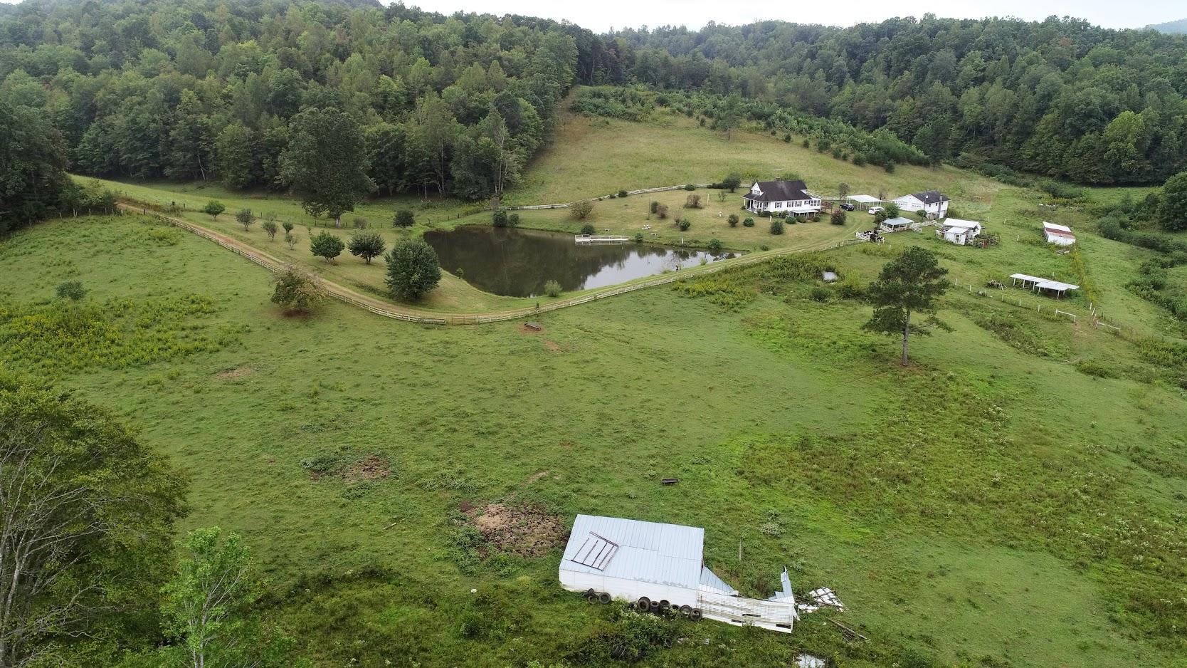 5560 Elamsville Road Stuart, VA 24171 - Photo 49 of 80 a aerial view of a house with a yard