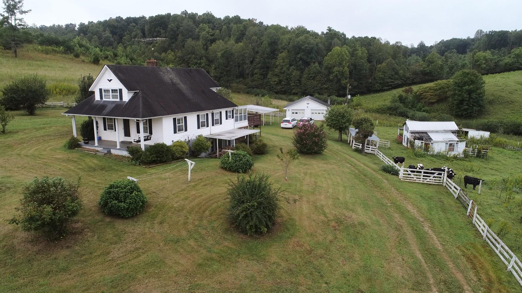 5560 Elamsville Road Stuart, VA 24171 - Photo 55 of 80 a view of a house with a garden