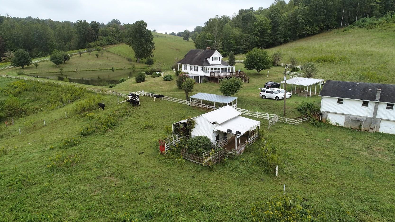 5560 Elamsville Road Stuart, VA 24171 - Photo 66 of 80 an aerial view of a house with outdoor space