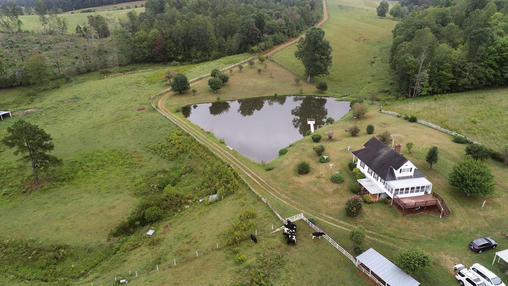 5560 Elamsville Road Stuart, VA 24171 - Photo 67 of 80 an aerial view of a house with a yard