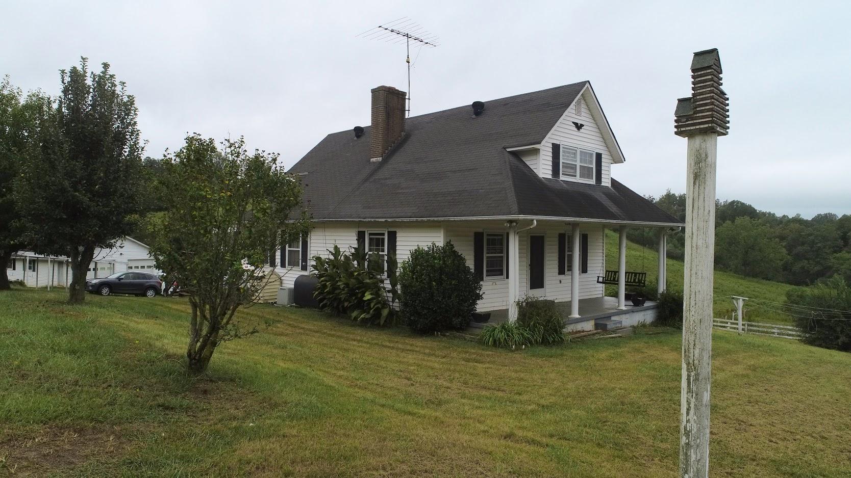 5560 Elamsville Road Stuart, VA 24171 - Photo 71 of 80 a front view of a house with garden