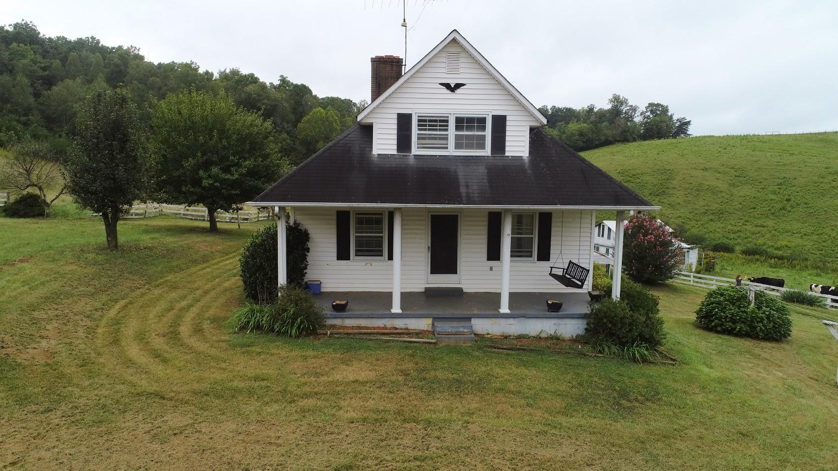 5560 Elamsville Road Stuart, VA 24171 - Photo 72 of 80 a front view of a house with a yard
