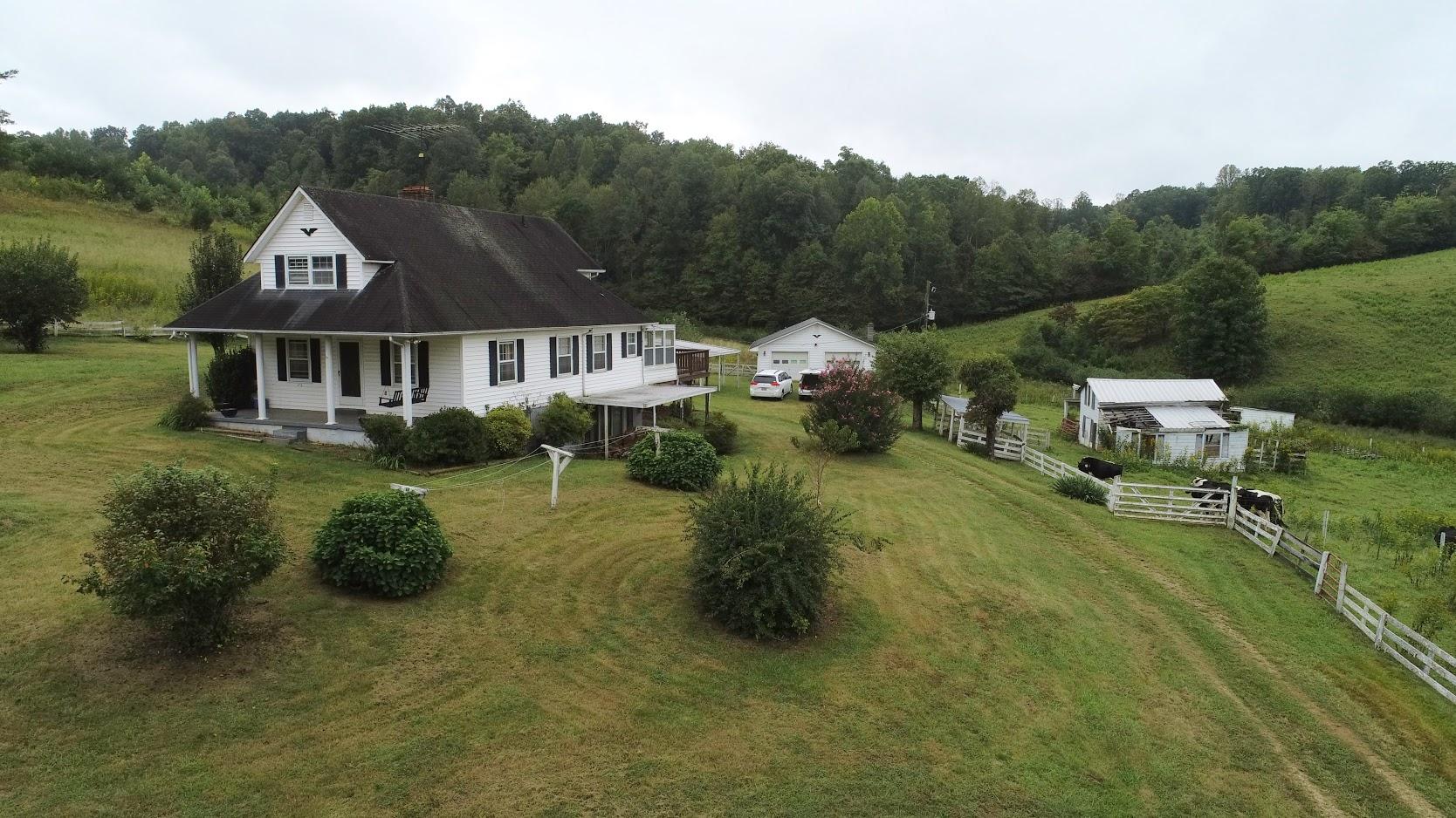 5560 Elamsville Road Stuart, VA 24171 - Photo 73 of 80 an aerial view of a house with a garden