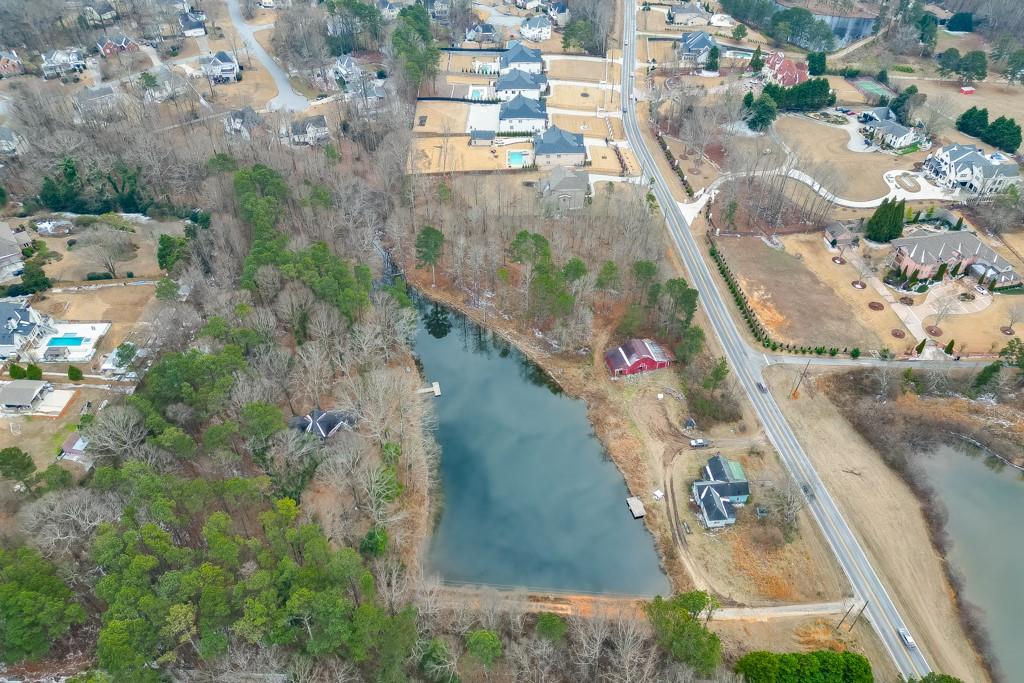 3251 Camp Branch Road Buford, GA 30519 - Photo 7 of 7 an aerial view of residential houses with outdoor space