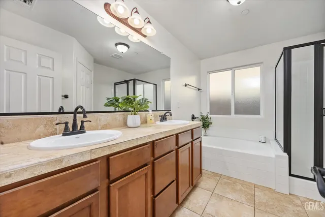a view of a bathroom with a sink and a mirror