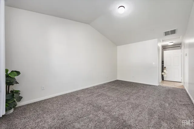 a bathroom with a sink mirror toilet and bathtub