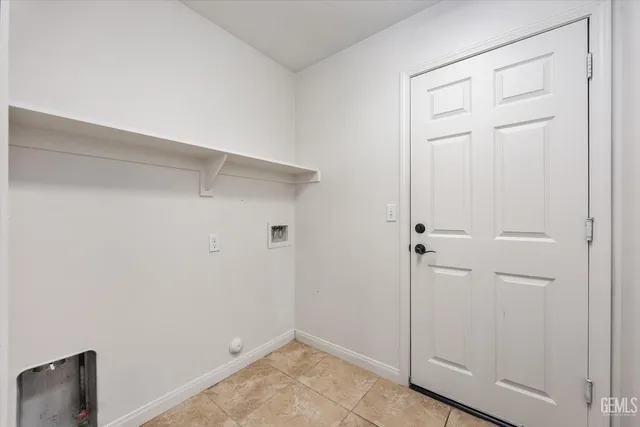 a view of a room with wooden walls