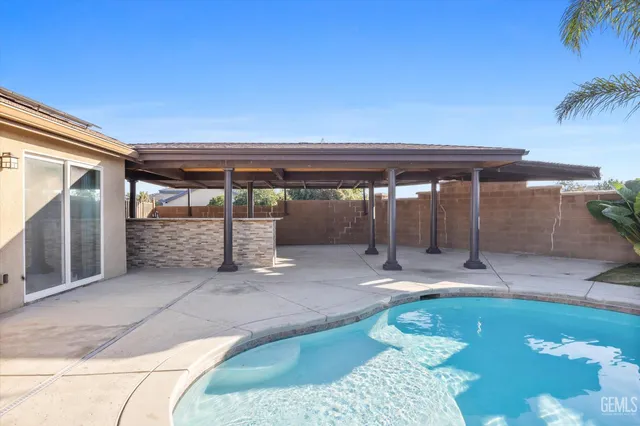 a view of a swimming pool with an outdoor space