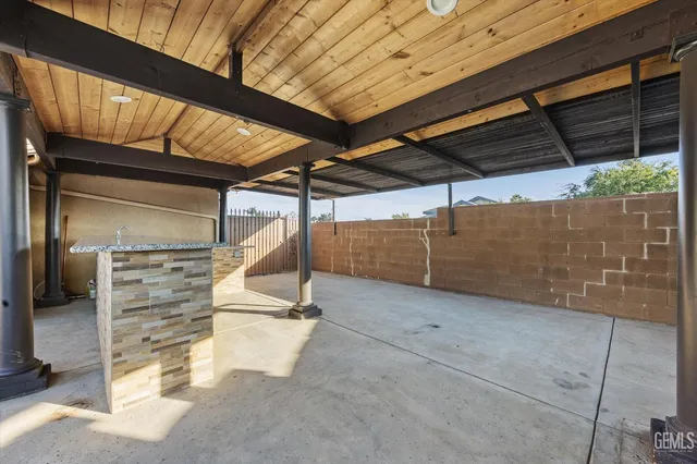 a view of a swimming pool with a patio