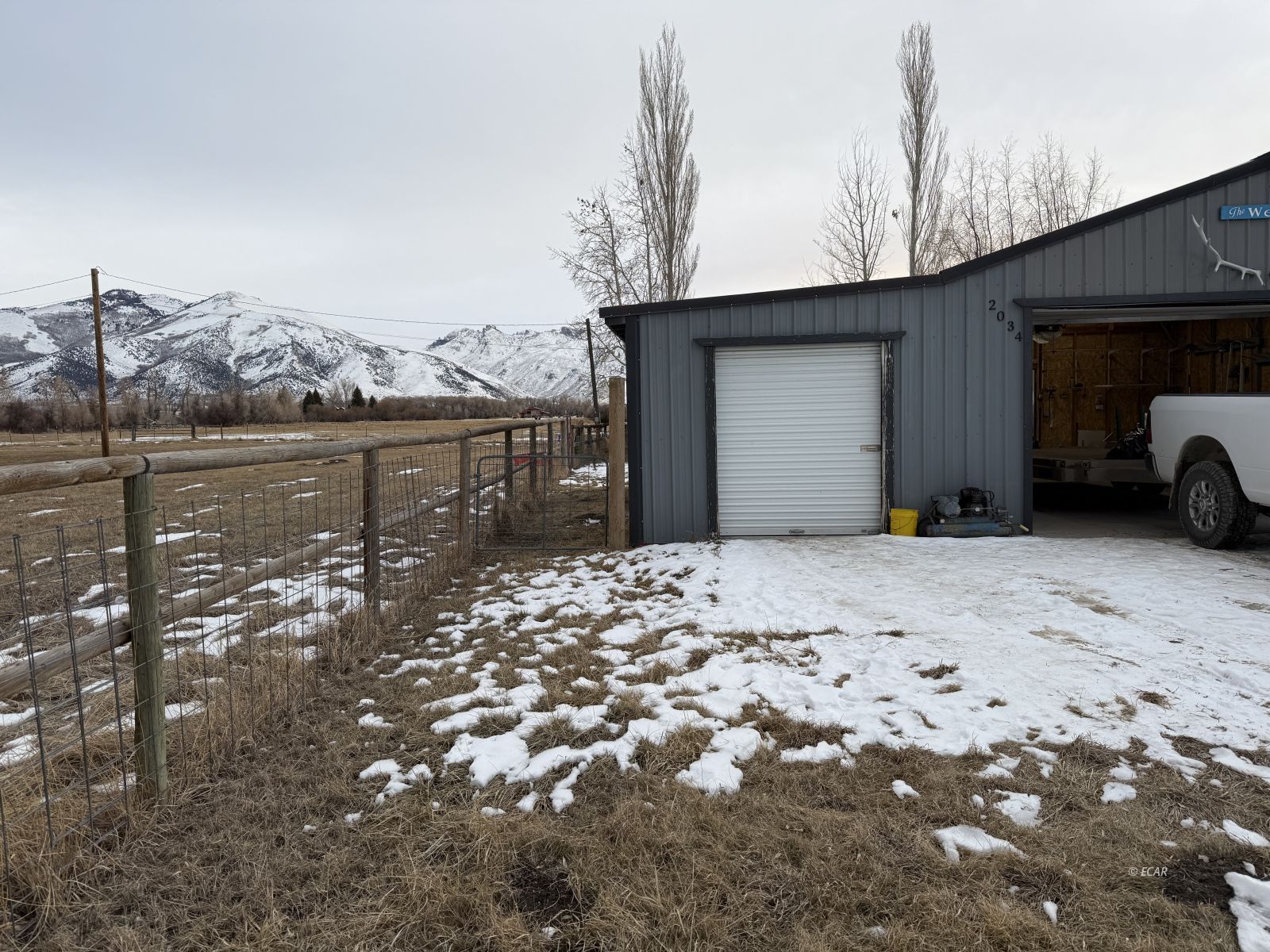 2034 Blume Ranch Road Lamoille, NV 89828 - Photo 20 of 45 a view of a house with a yard
