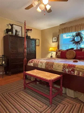 a view of walk in closet with clothes