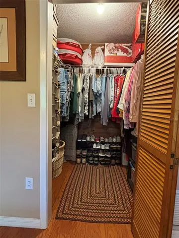 a kitchen with a stove a sink and a refrigerator