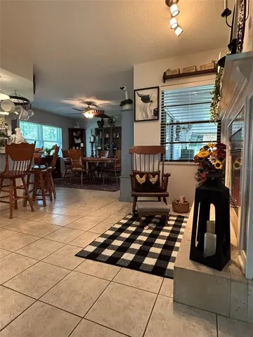 a dinning table and chairs in a room