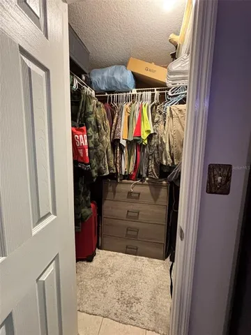 a view of a chairs in a backyard