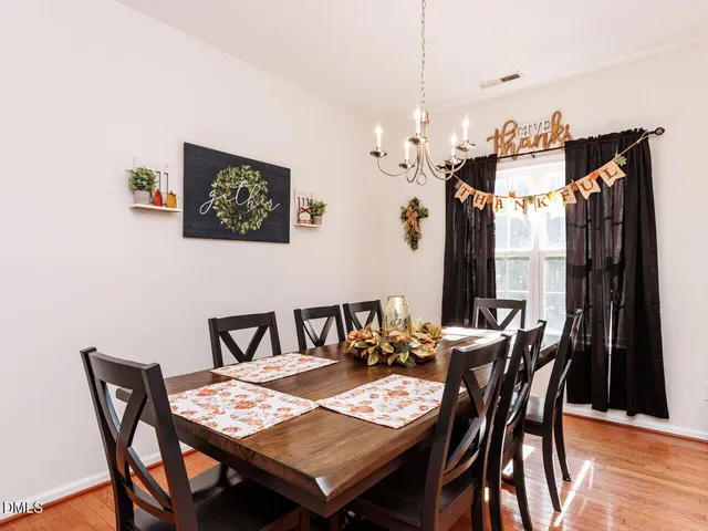 a living room with furniture a window and a fireplace
