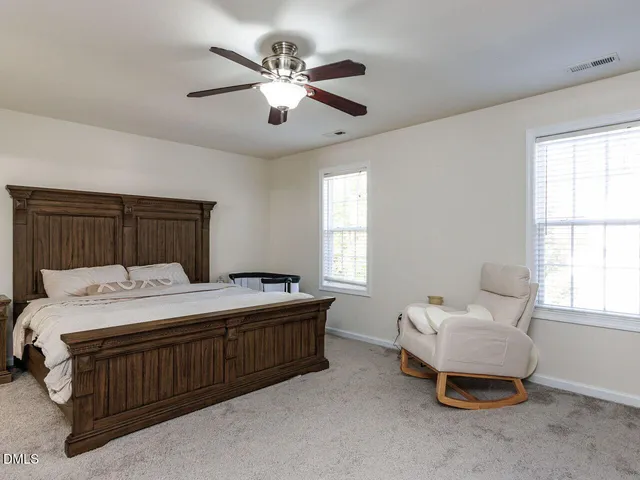 a kitchen with stainless steel appliances a stove a sink and a microwave