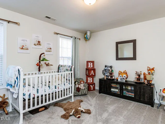 a room with furniture and musical instruments