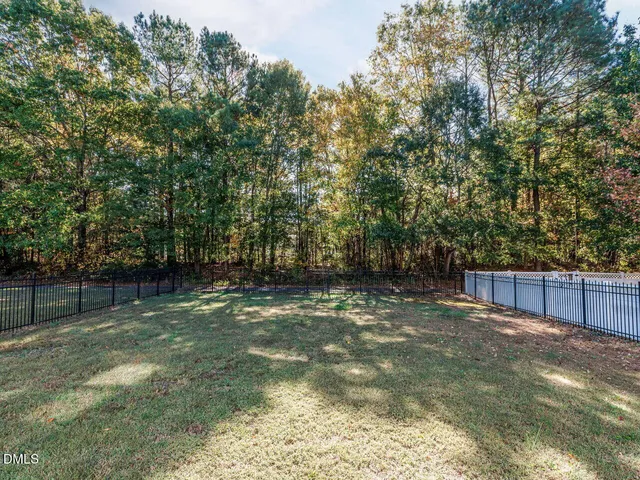 a kitchen with a sink and a window