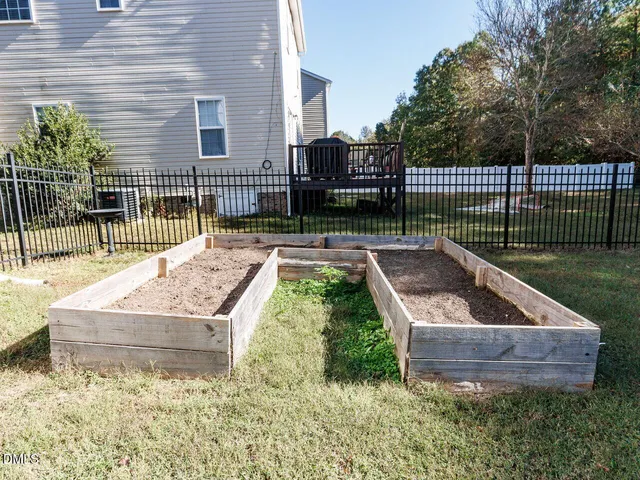 a bed room with furniture and a window