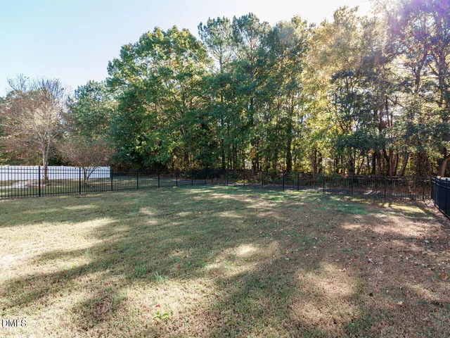 a view of a chairs and table in the balcony