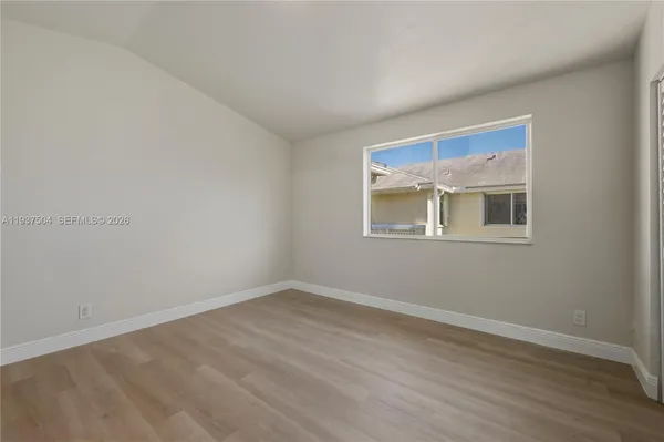 an empty room with closet