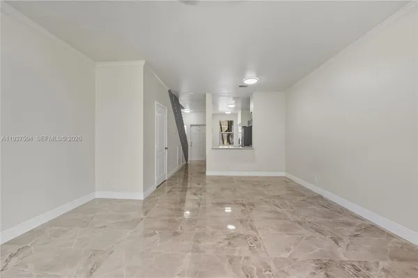 an empty room with a natural light