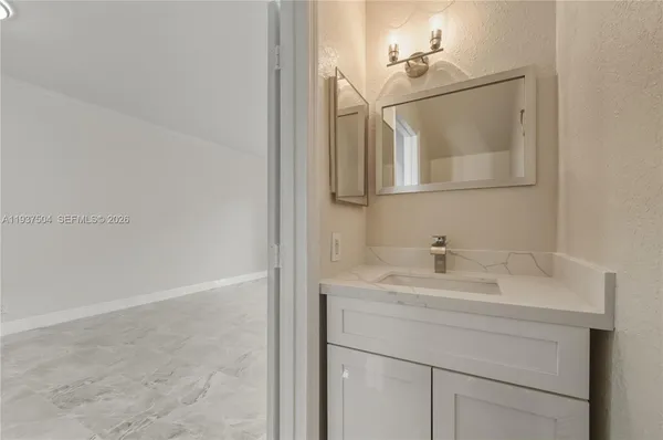 a view of a livingroom with a furniture