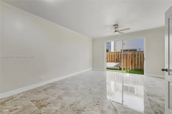 a kitchen with a stove and a refrigerator
