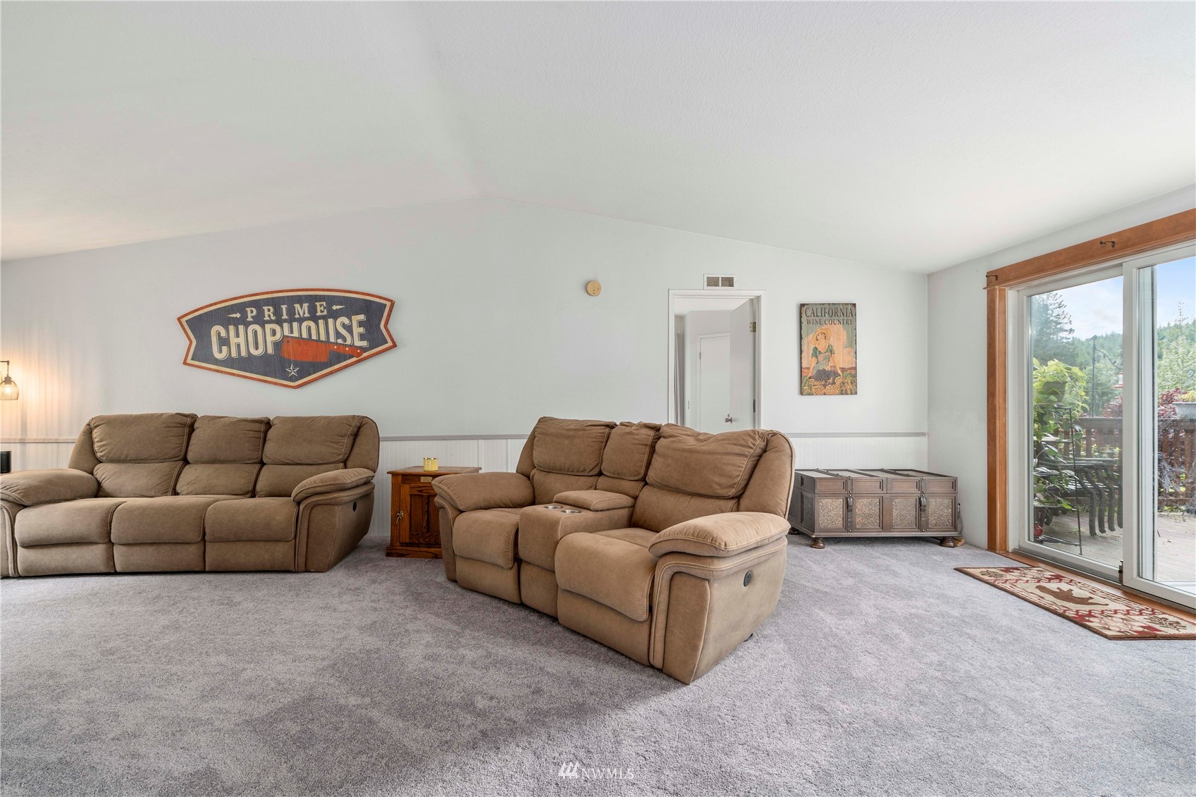 2721 South Lake Roesiger Road Snohomish, WA 98290 - Photo 14 of 26 a living room with furniture and a large window