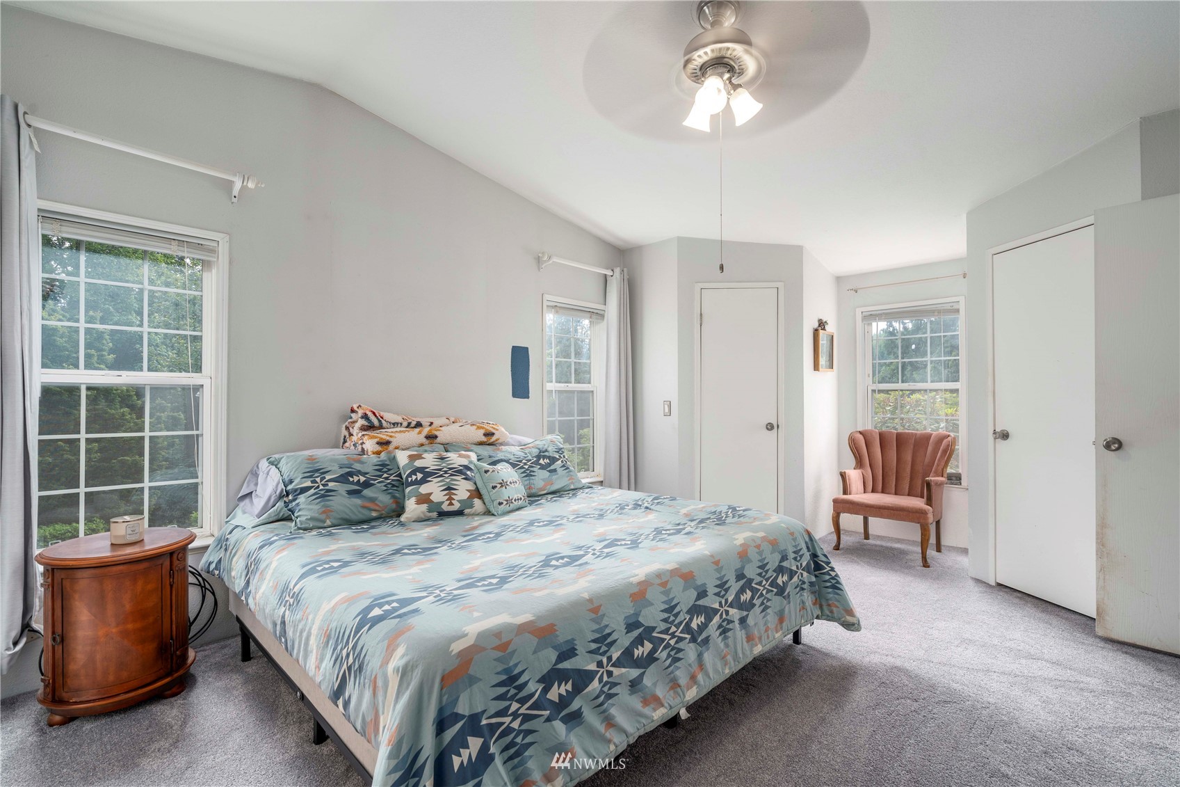2721 South Lake Roesiger Road Snohomish, WA 98290 - Photo 17 of 26 a bedroom with a large bed and a window