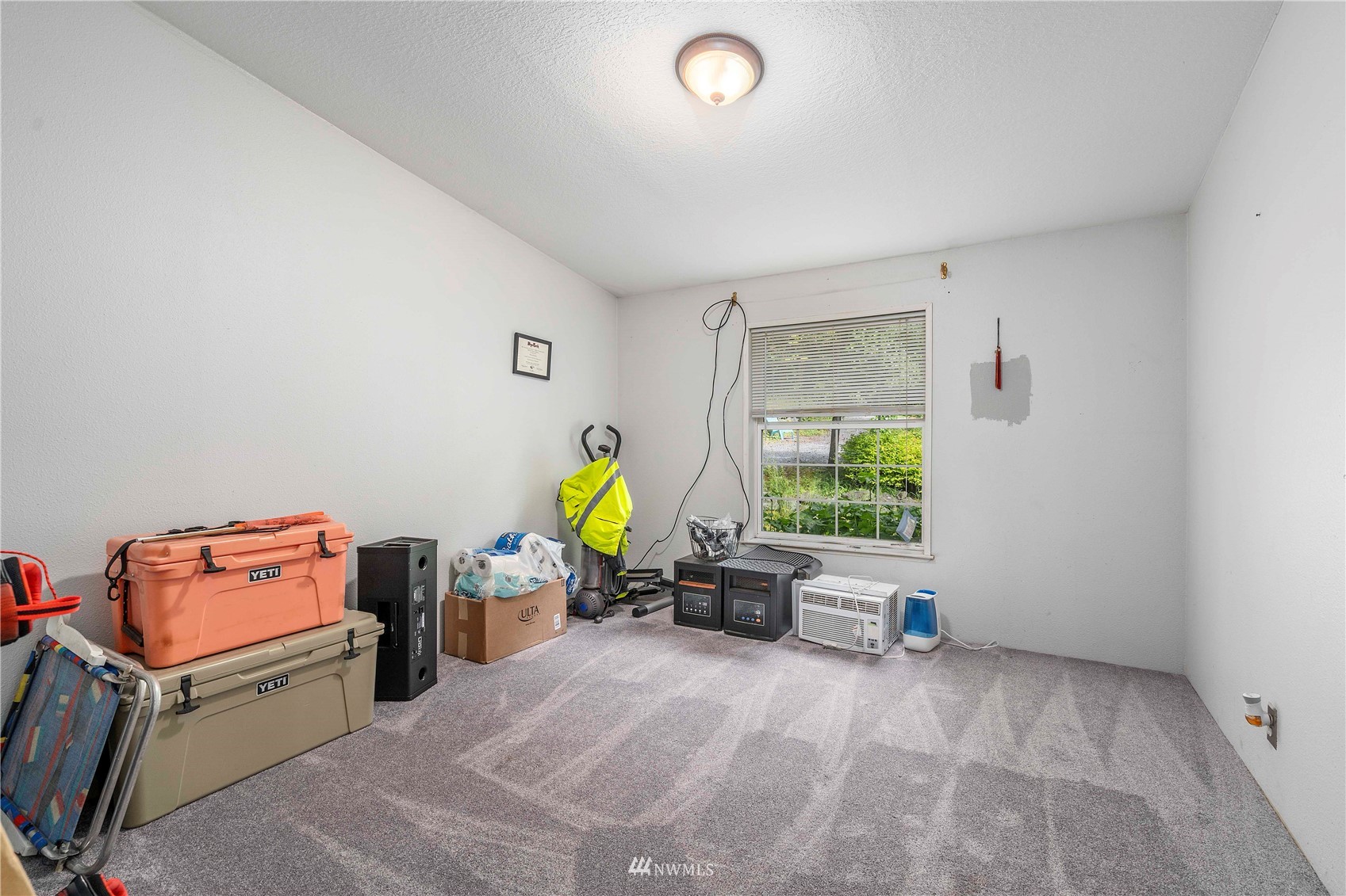 2721 South Lake Roesiger Road Snohomish, WA 98290 - Photo 20 of 26 a living room with furniture and a window