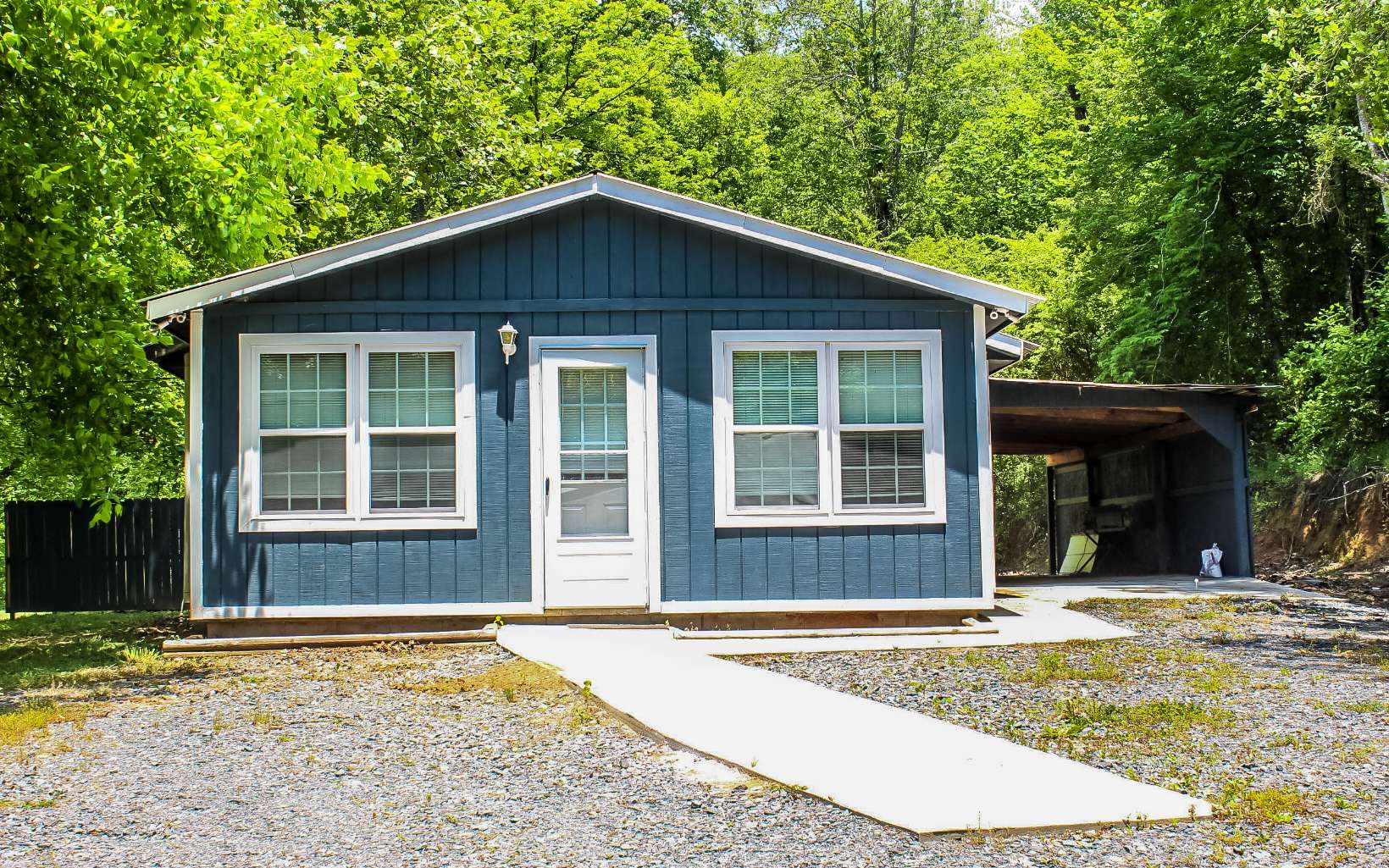 1466 Craigtown Road Ellijay, GA 30540 - Photo 1 of 4 a front view of a house with a yard