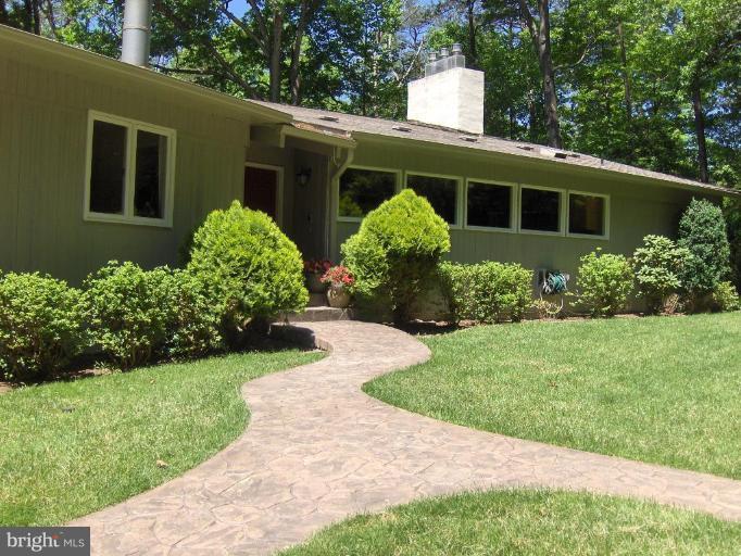 10704 Hunters Valley Road Vienna, VA 22181 - Photo 22 of 26 Lovely stone path leads to front door and more