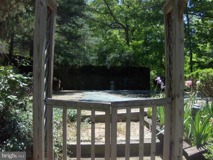 10704 Hunters Valley Road Vienna, VA 22181 - Photo 23 of 26 Entrance to pool and yard