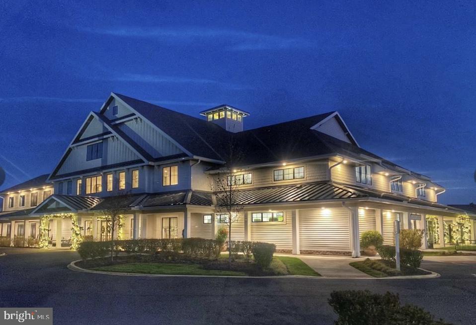 38896 Blue Indigo Road Selbyville, DE 19975 - Photo 55 of 86 a view of a building with a street