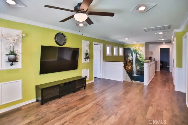 a view of a livingroom with furniture and window