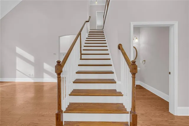 a view of room with a ceiling fan and window