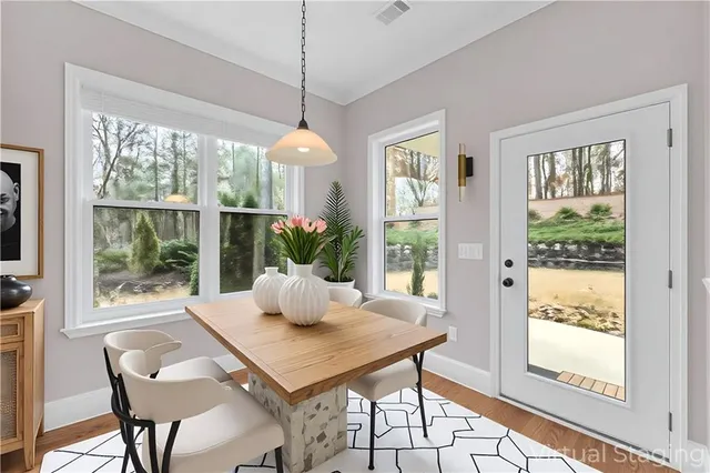 a bathroom with a shower sink vanity and mirror