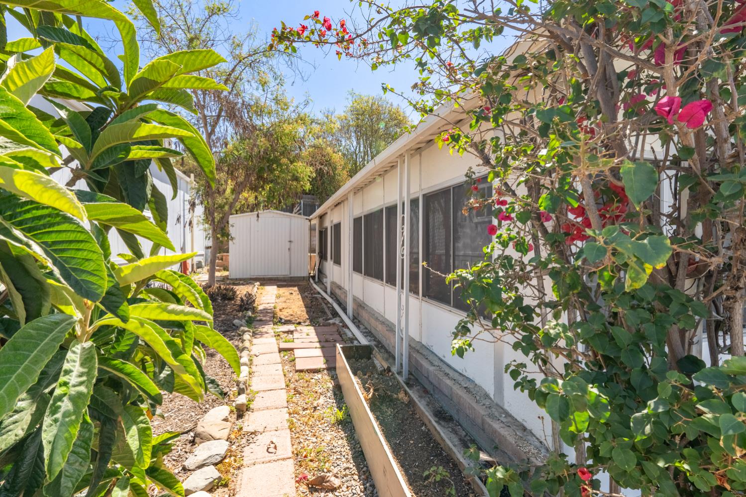 1075 Loma Drive, Unit 66 Ojai, CA 93023 - Photo 12 of 22 a balcony with beautiful flowers