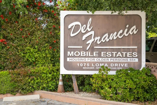 a view of a house with swimming pool