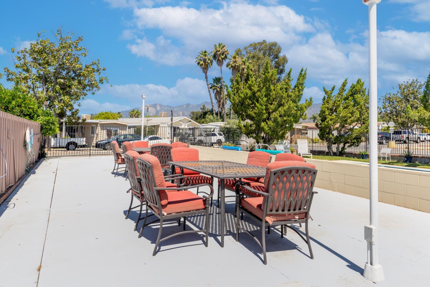1075 Loma Drive, Unit 66 Ojai, CA 93023 - Photo 19 of 22 a view of a patio with a table and chairs