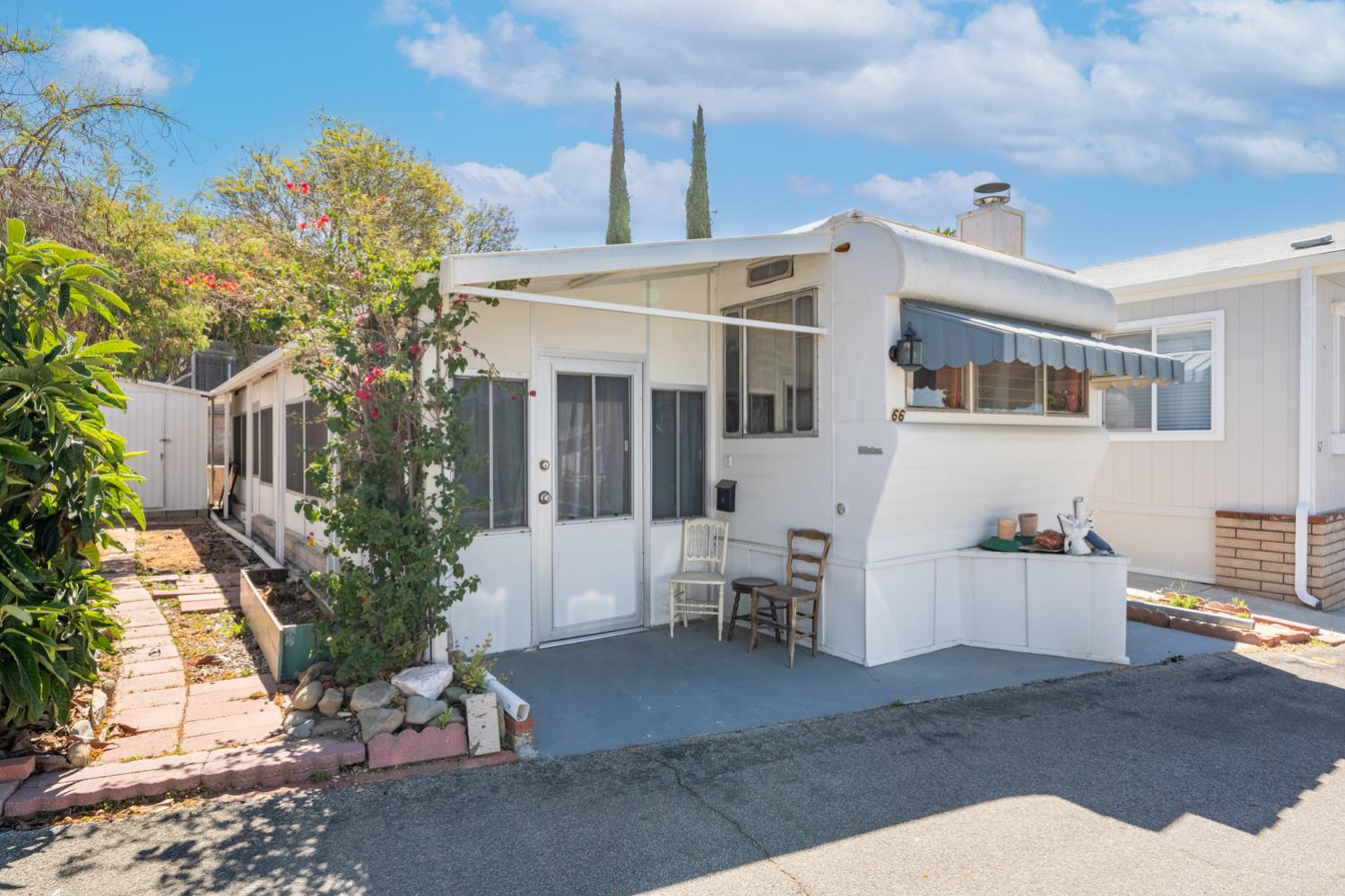 1075 Loma Drive, Unit 66 Ojai, CA 93023 - Photo 3 of 22 a view of a house with backyard