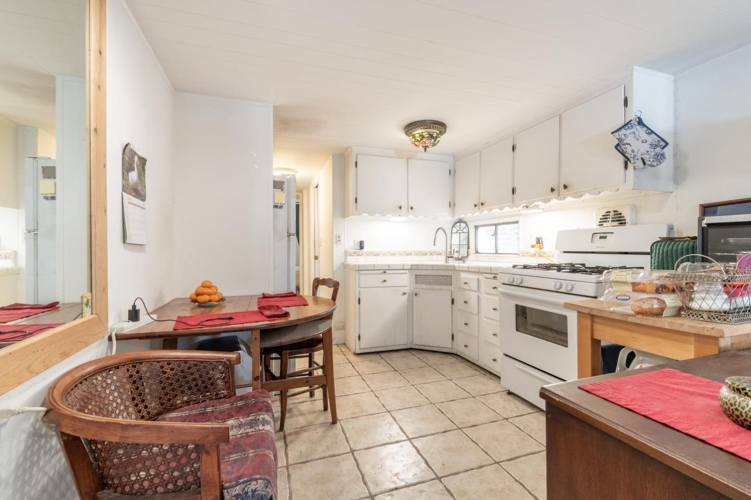 1075 Loma Drive, Unit 66 Ojai, CA 93023 - Photo 5 of 22 a kitchen that has a sink and cabinets