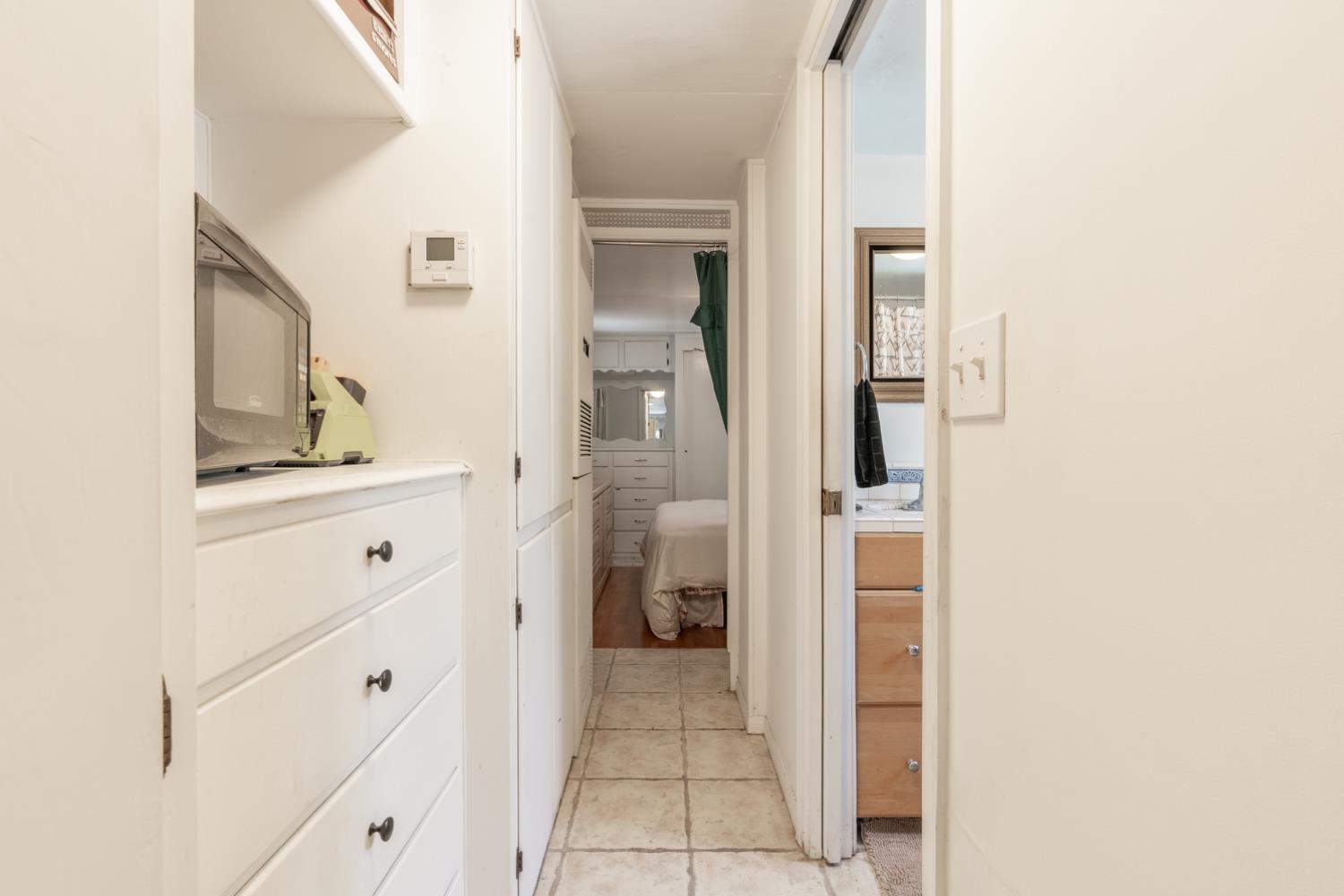 1075 Loma Drive, Unit 66 Ojai, CA 93023 - Photo 8 of 22 a bathroom with a sink and a mirror