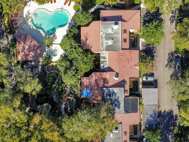 a view of a swimming pool with a garden