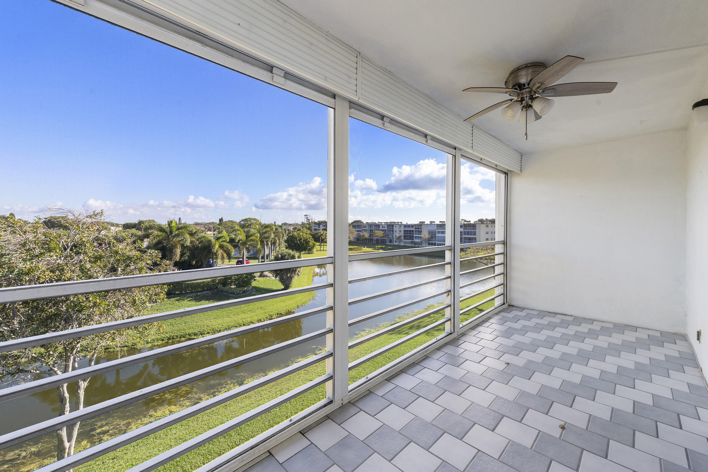 4043 Rexford Drive, Unit 4043 Boca Raton, FL 33434 - Photo 15 of 27 a view of a balcony with city view