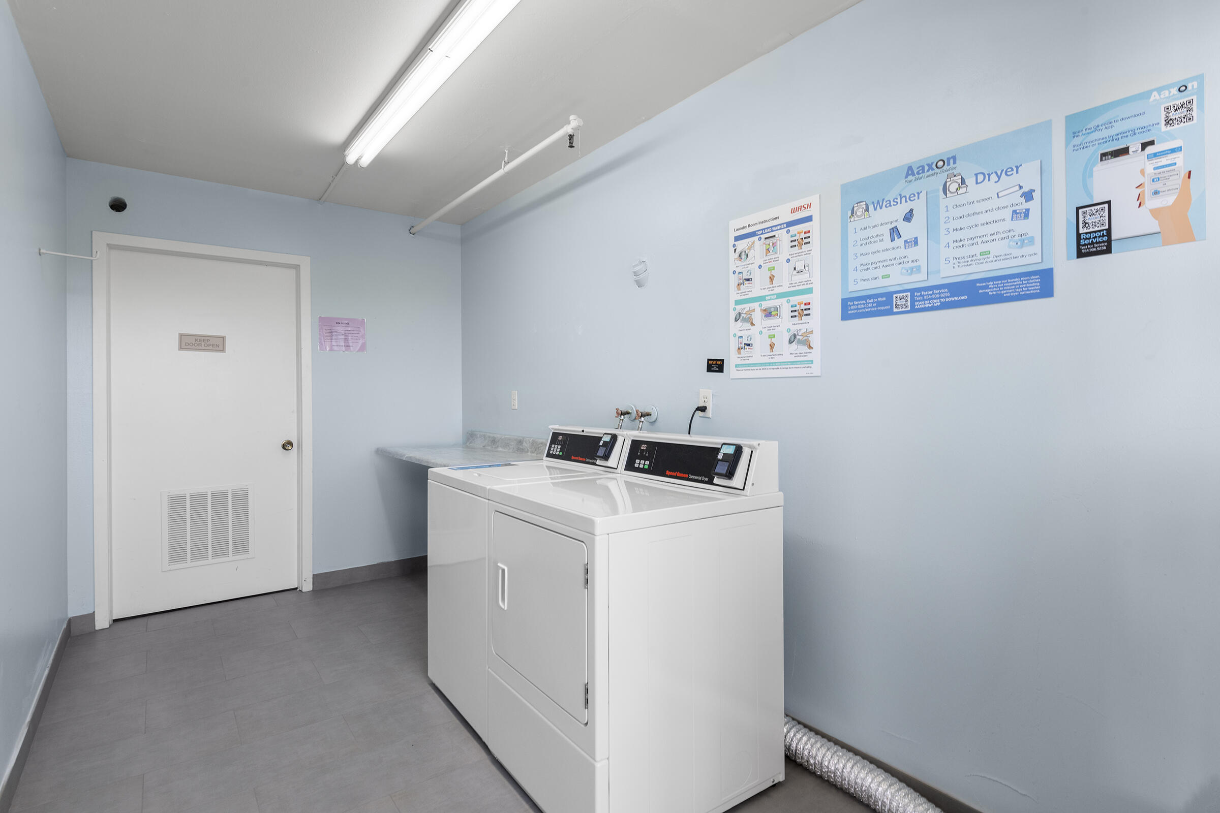 4043 Rexford Drive, Unit 4043 Boca Raton, FL 33434 - Photo 19 of 27 a utility room with dryer and washer