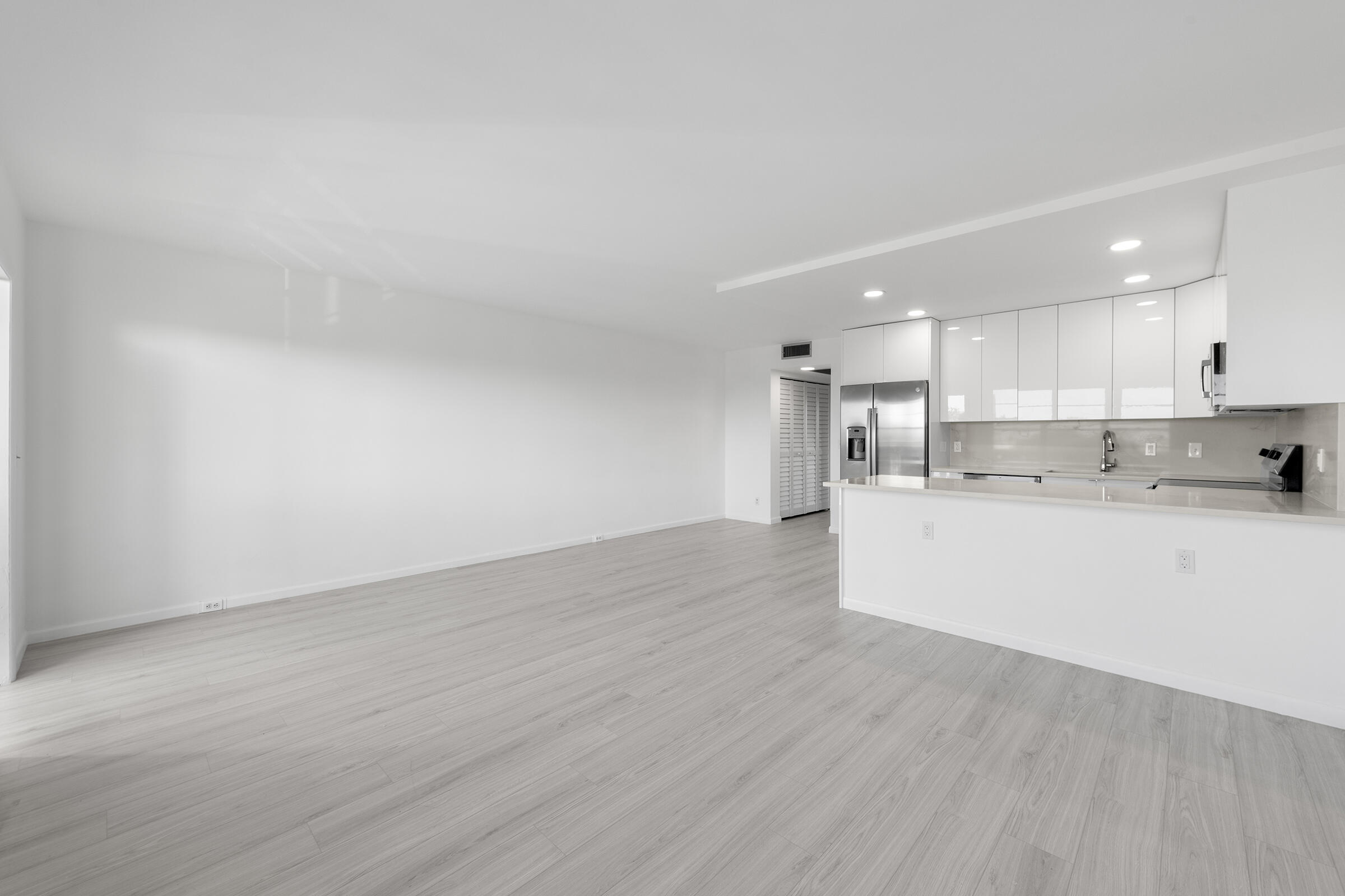 4043 Rexford Drive, Unit 4043 Boca Raton, FL 33434 - Photo 9 of 27 a view of kitchen with wooden floor