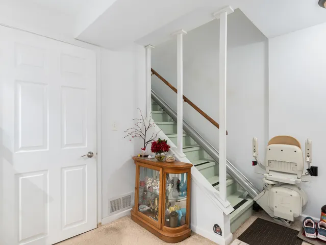 a view of entryway with a front door